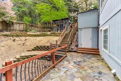 a view of entryway with wooden stairs