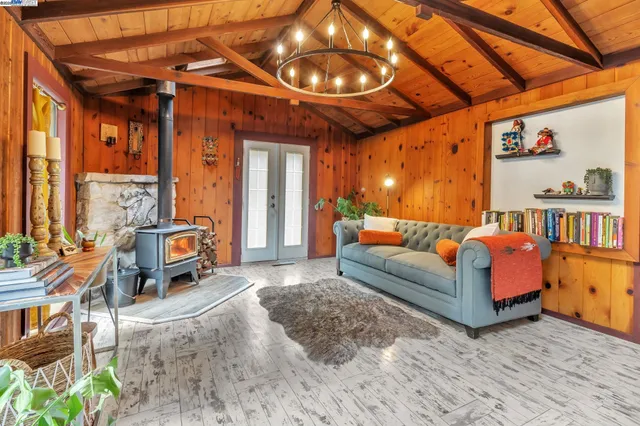 a outdoor living space with furniture and a fireplace