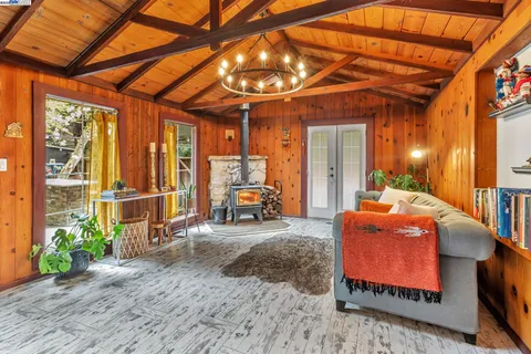 a backyard of a house with sofas