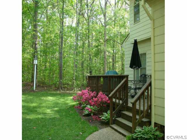 1901 Thornleigh Road Midlothian, VA 23113 - Photo 2 of 9 a view of a house with a backyard