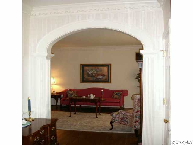 1901 Thornleigh Road Midlothian, VA 23113 - Photo 4 of 9 a bench sitting in front of a door