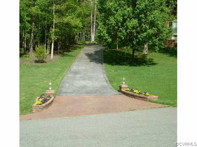1901 Thornleigh Road Midlothian, VA 23113 - Photo 5 of 9 a view of a park with plants and trees