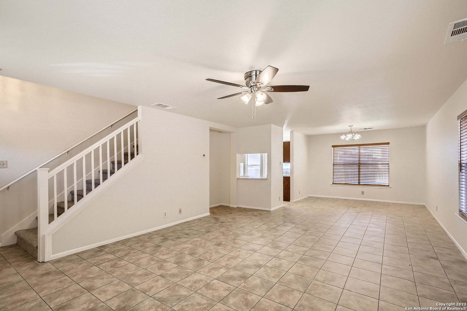 9655 Addersley Drive San Antonio, TX 78254 - Photo 12 of 20 a view of an empty room with windows