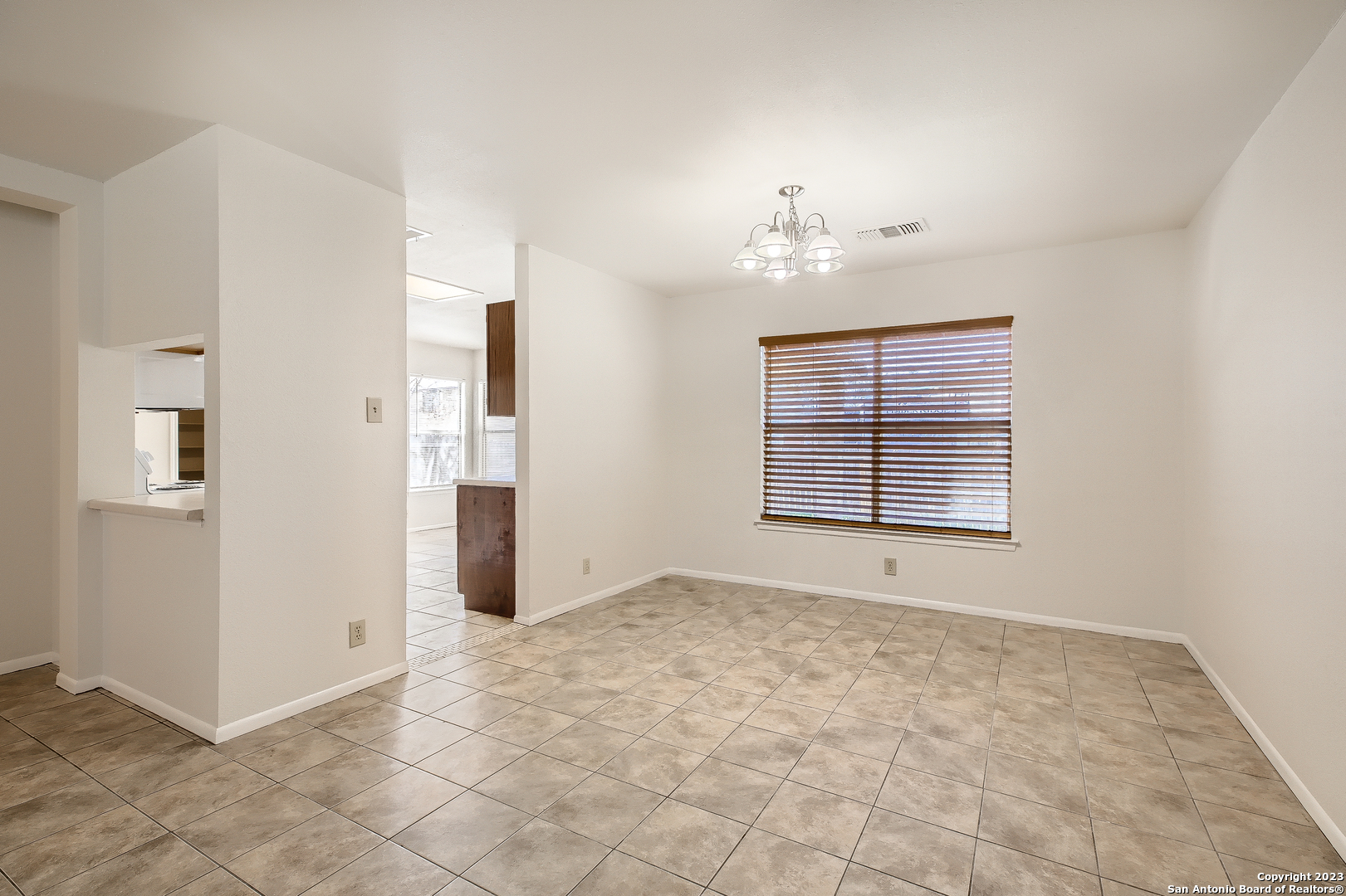 9655 Addersley Drive San Antonio, TX 78254 - Photo 14 of 20 wooden floor in an empty room with a window