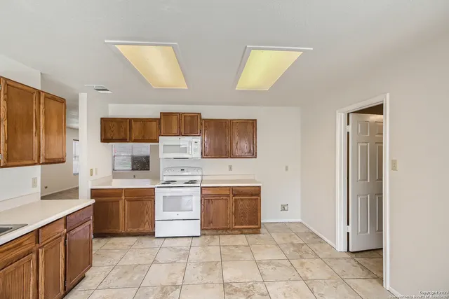 a kitchen with a cabinets and counter space