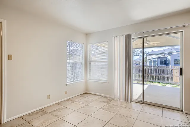 a view of an empty room with window