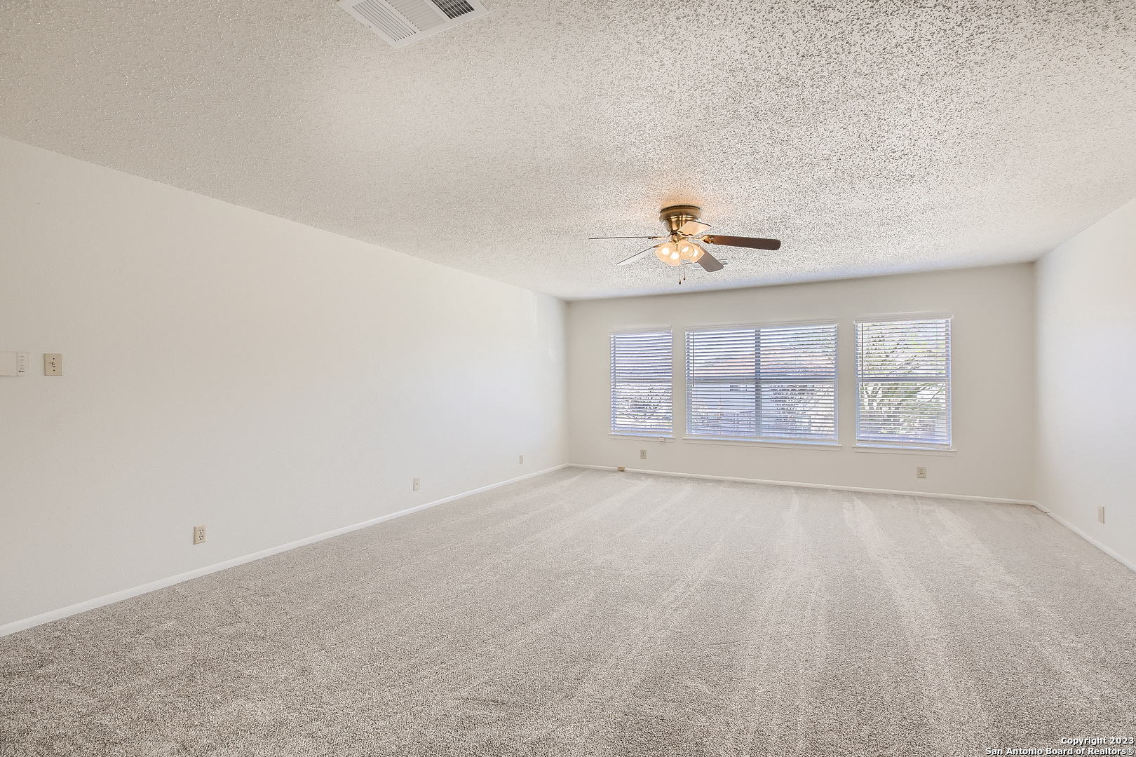 9655 Addersley Drive San Antonio, TX 78254 - Photo 6 of 20 an empty room with a window