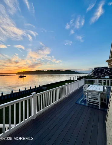 a view of roof deck with patio