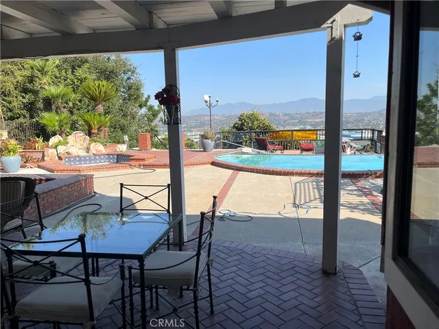 a bathroom with a tub and a sink