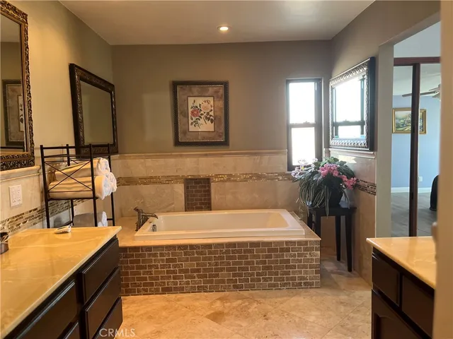 a view of a roof with wooden floor and fence
