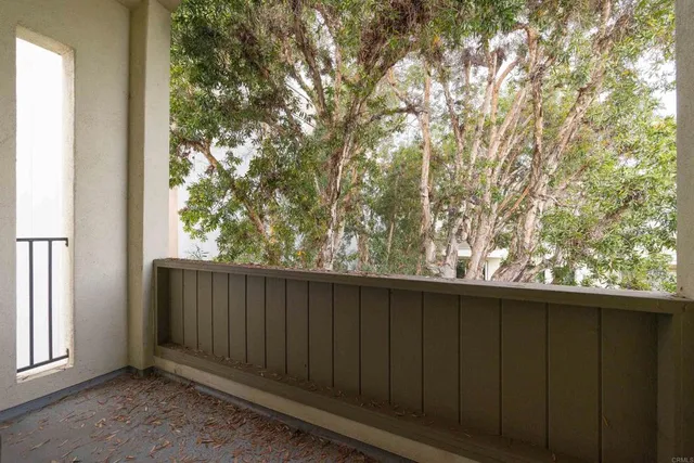 a view of outdoor space with wooden fence