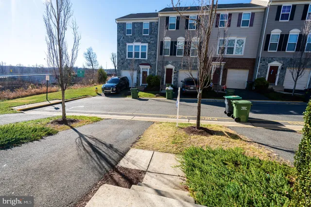 a front view of a house with a rug