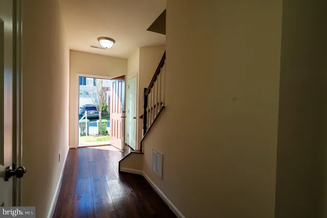 a room with furniture and a gate
