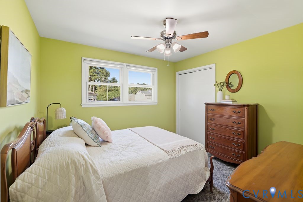 2701 Maury Road Petersburg, VA 23805 - Photo 29 of 41 a bedroom with a bed and a dresser