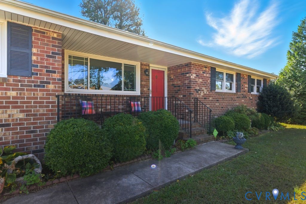2701 Maury Road Petersburg, VA 23805 - Photo 4 of 41 a front view of a house with garden