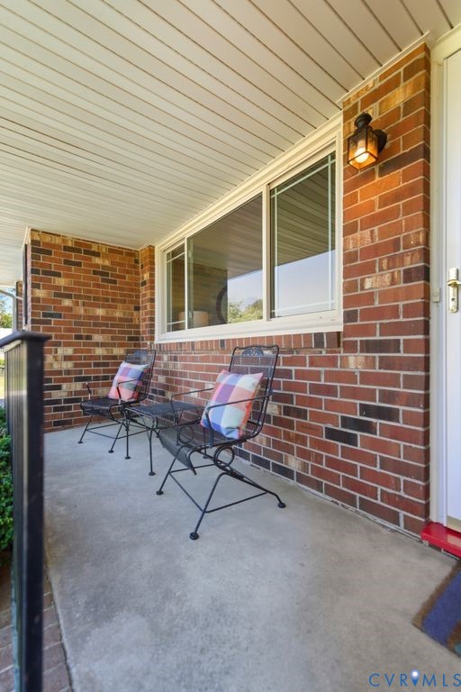 2701 Maury Road Petersburg, VA 23805 - Photo 5 of 41 a backyard of a house with outdoor seating