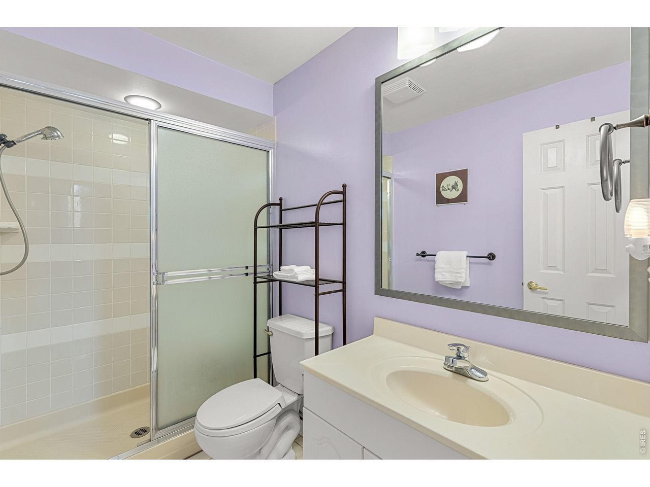 4490 Clay Street Boulder, CO 80301 - Photo 32 of 50 a bathroom with a sink toilet and shower