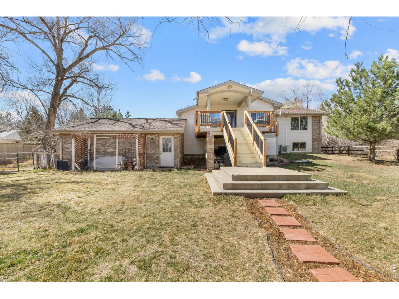 4490 Clay Street Boulder, CO 80301 - Photo 44 of 50 a front view of a house with a yard