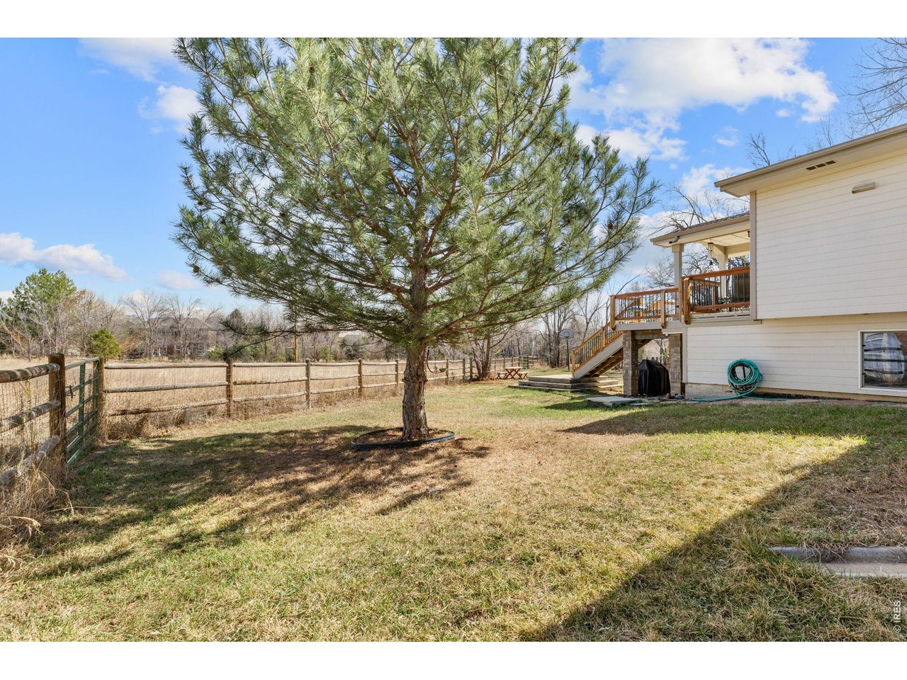 4490 Clay Street Boulder, CO 80301 - Photo 46 of 50 a view of a yard with wooden fence