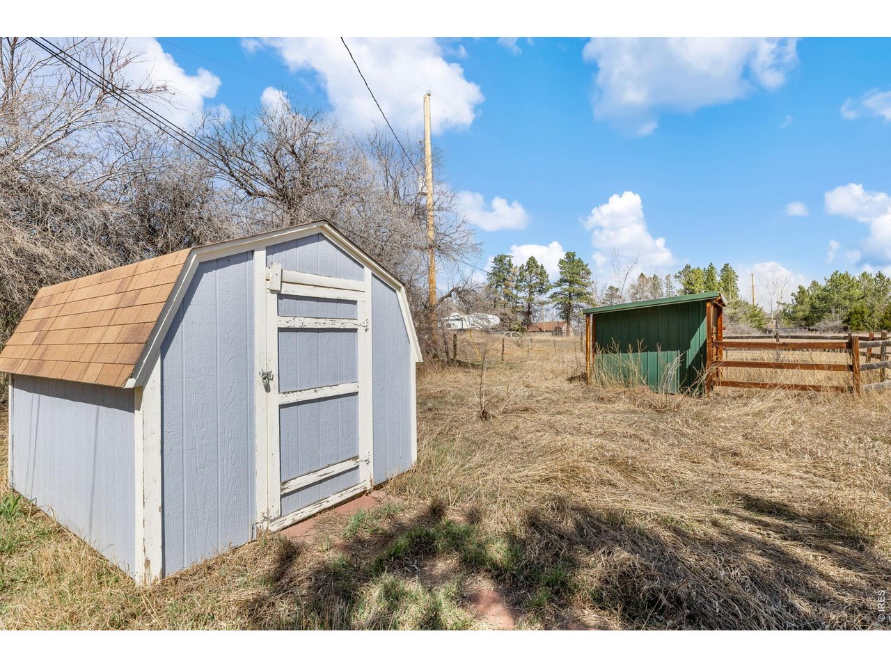 4490 Clay Street Boulder, CO 80301 - Photo 47 of 50 a backyard of a house with table and chairs