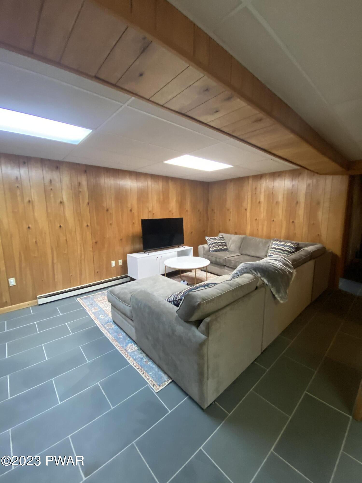 101 Maple Ridge Drive Hawley, PA 18428 - Photo 38 of 61 a view of a room with gym equipment