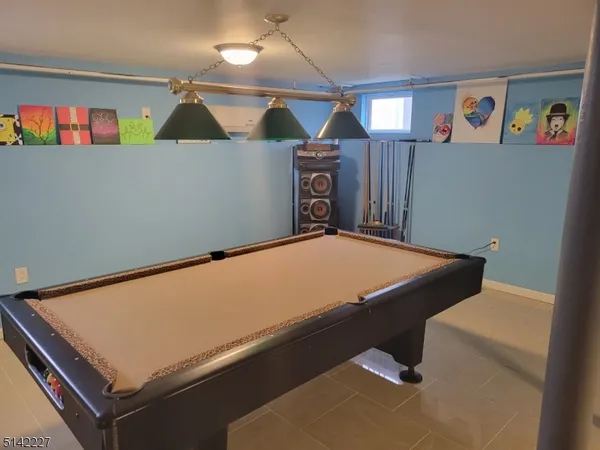 a room with furniture and window