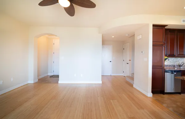 a view of an empty room with a window