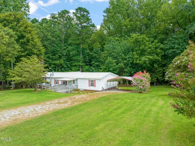 a house view with a garden space