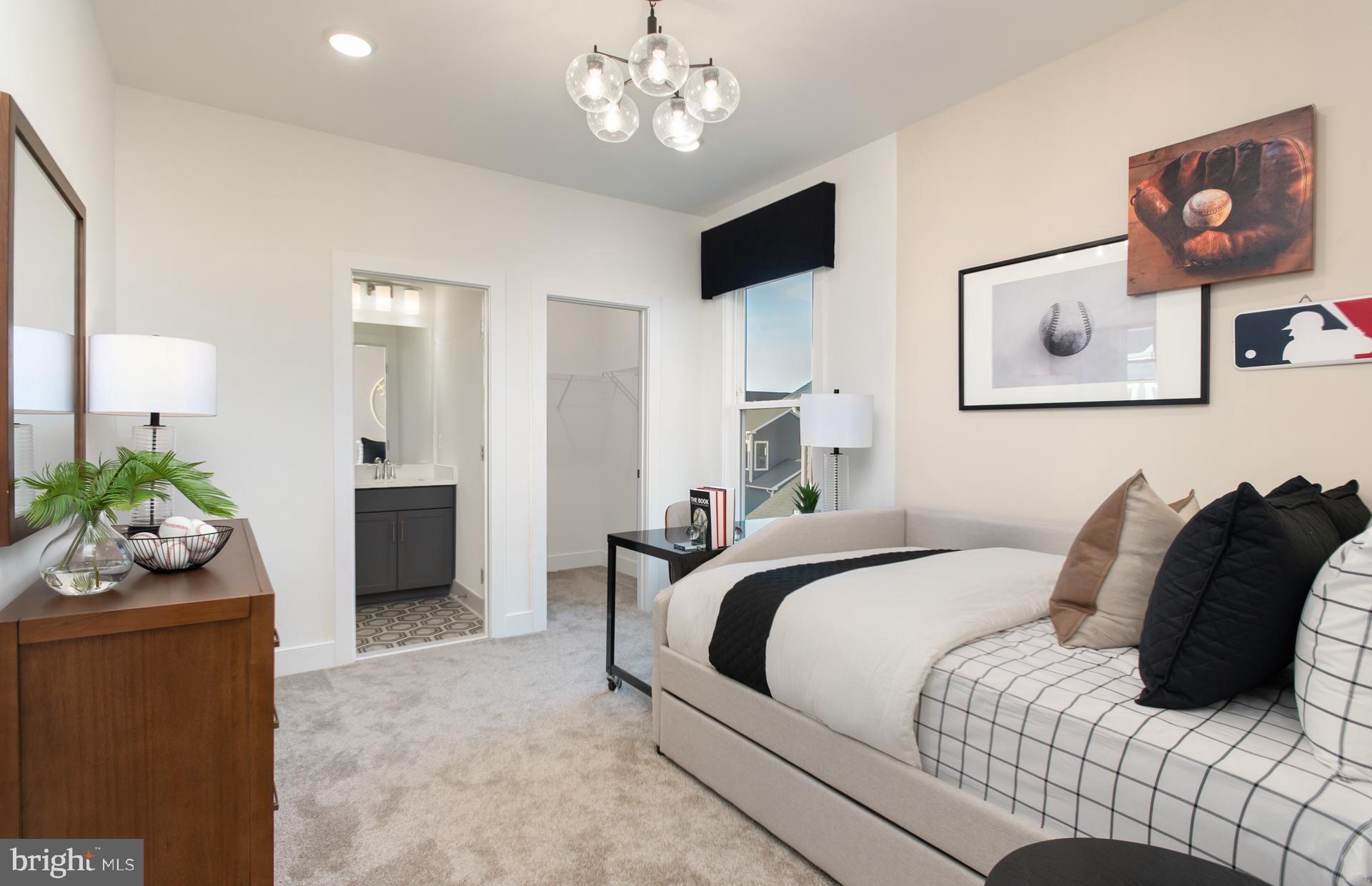 18283 Cresswell Rst Lane Leesburg, VA 20176 - Photo 30 of 63 a bedroom with a bed and ceiling fan