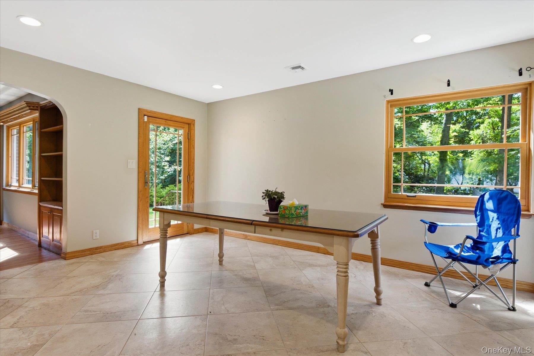 42 Cliff Road Port Jefferson, NY 11777 - Photo 8 of 22 a living room with furniture and a window
