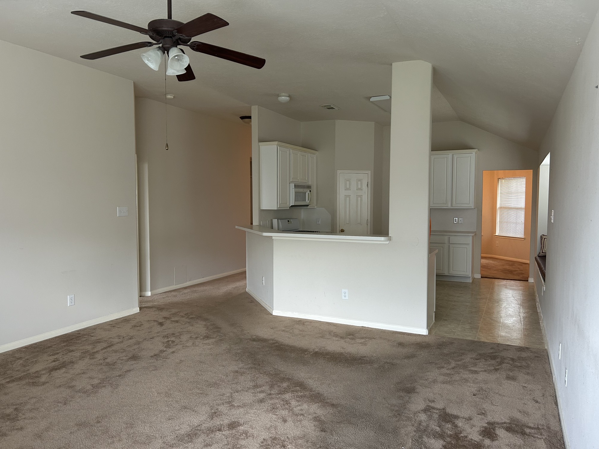 5119 Spring Oak Drive Pasadena, TX 77505 - Photo 5 of 11 a view of a kitchen with a sink and cabinets