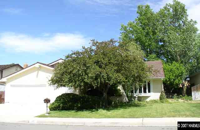 4870 Warren Way Reno, NV 89509 - Photo 1 of 8 a view of a house with a yard