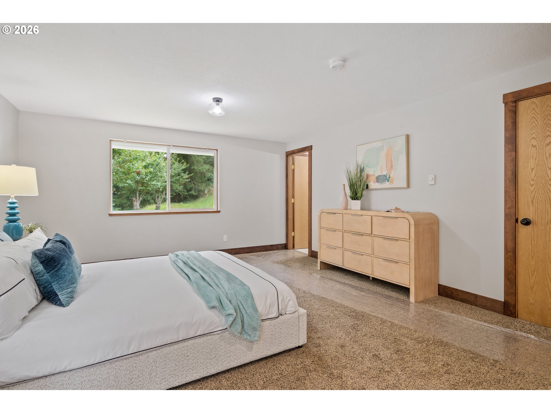 650 Marvin Road Tillamook, OR 97141 - Photo 25 of 48 a bedroom with a bed and a window