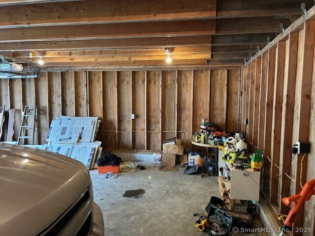 5 Shepaug Road Newtown, CT 06482 - Photo 13 of 20 a room with furniture and a chandelier