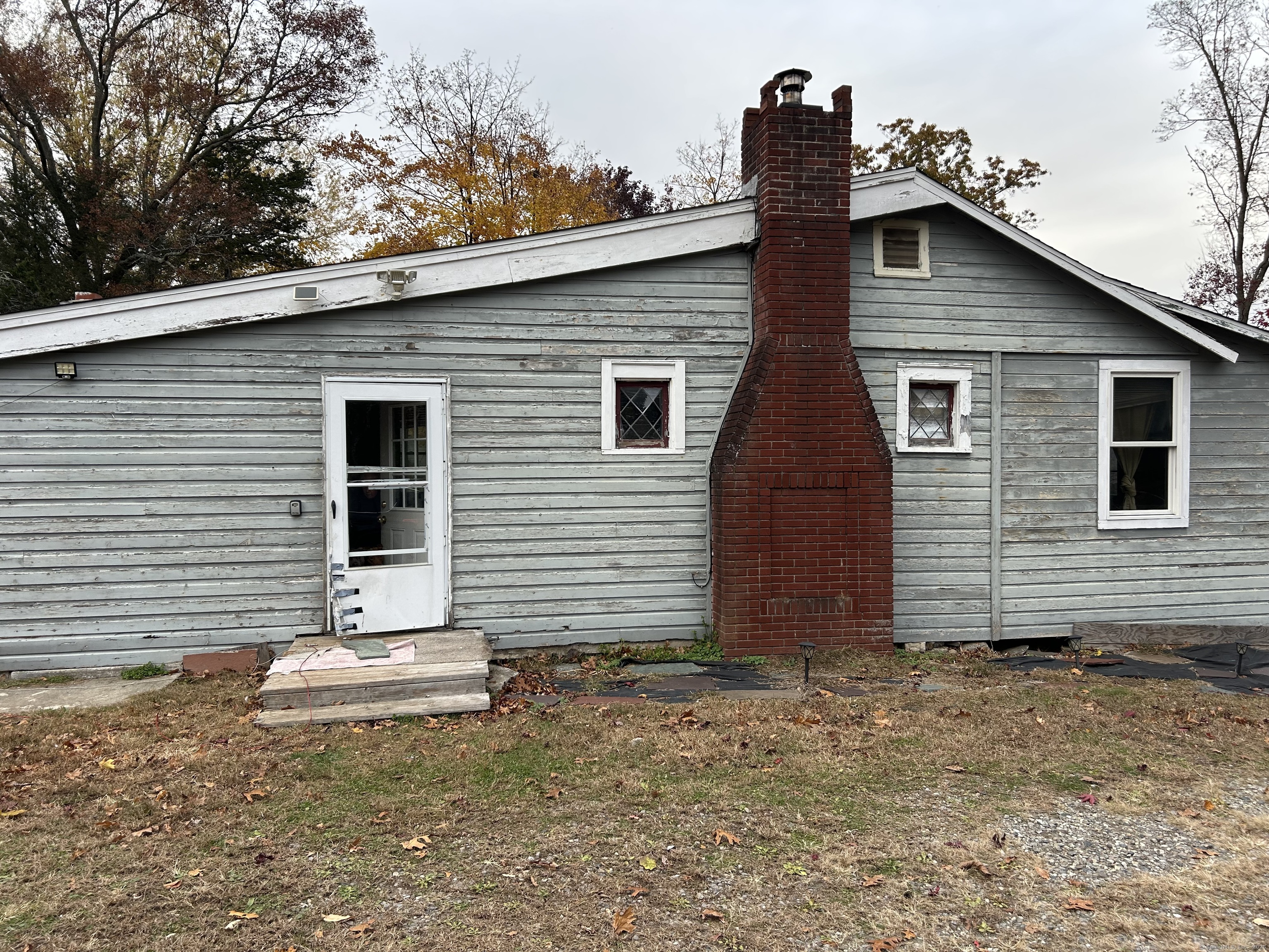 5 Shepaug Road Newtown, CT 06482 - Photo 14 of 20 a view of a house with a yard