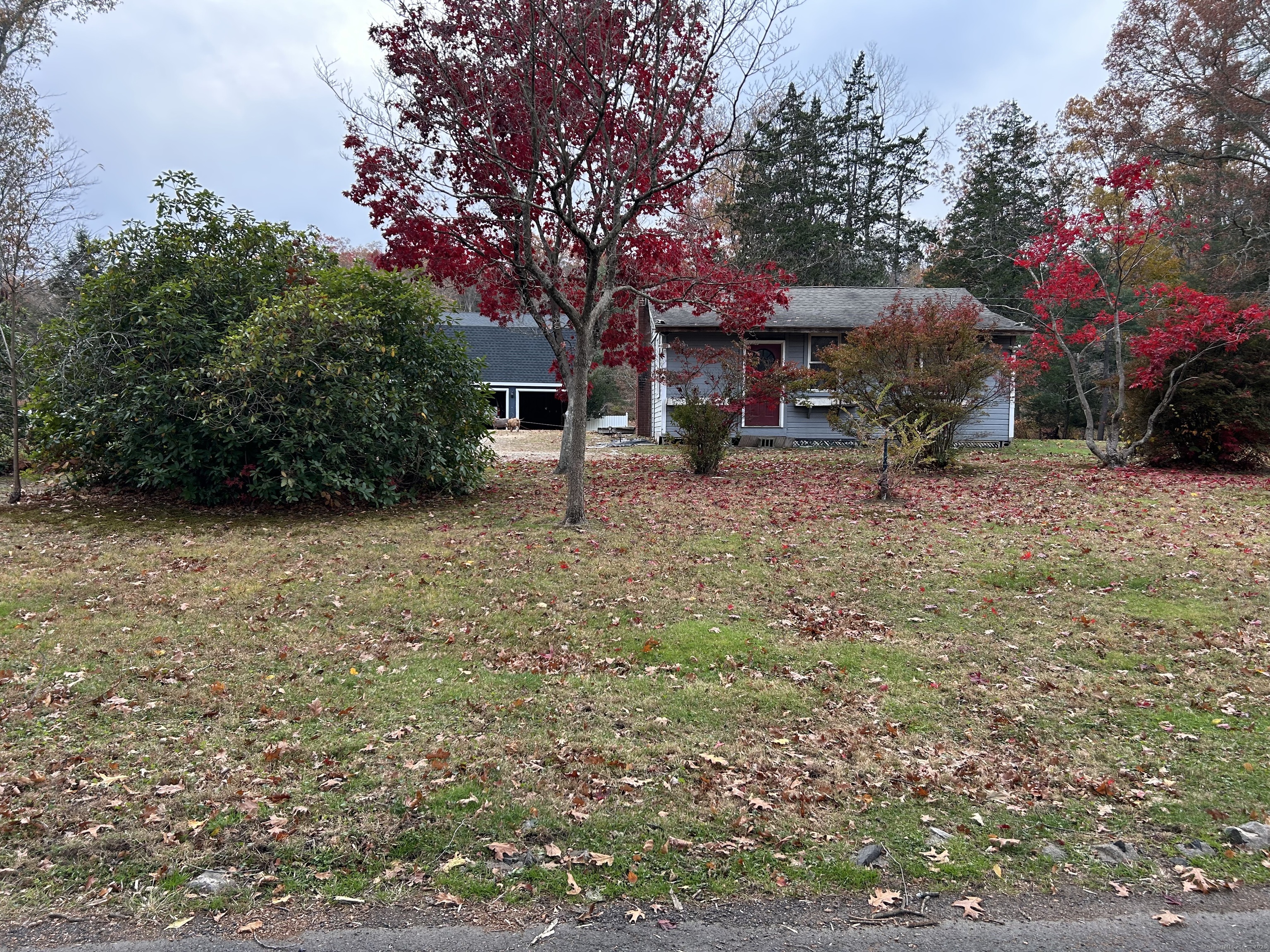 5 Shepaug Road Newtown, CT 06482 - Photo 20 of 20 a view of a house with a yard