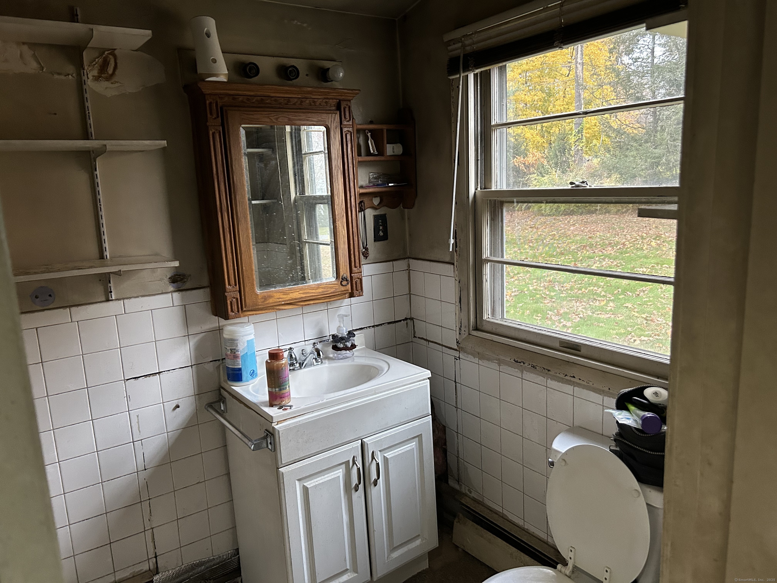 5 Shepaug Road Newtown, CT 06482 - Photo 7 of 20 a bathroom with a sink toilet and tub