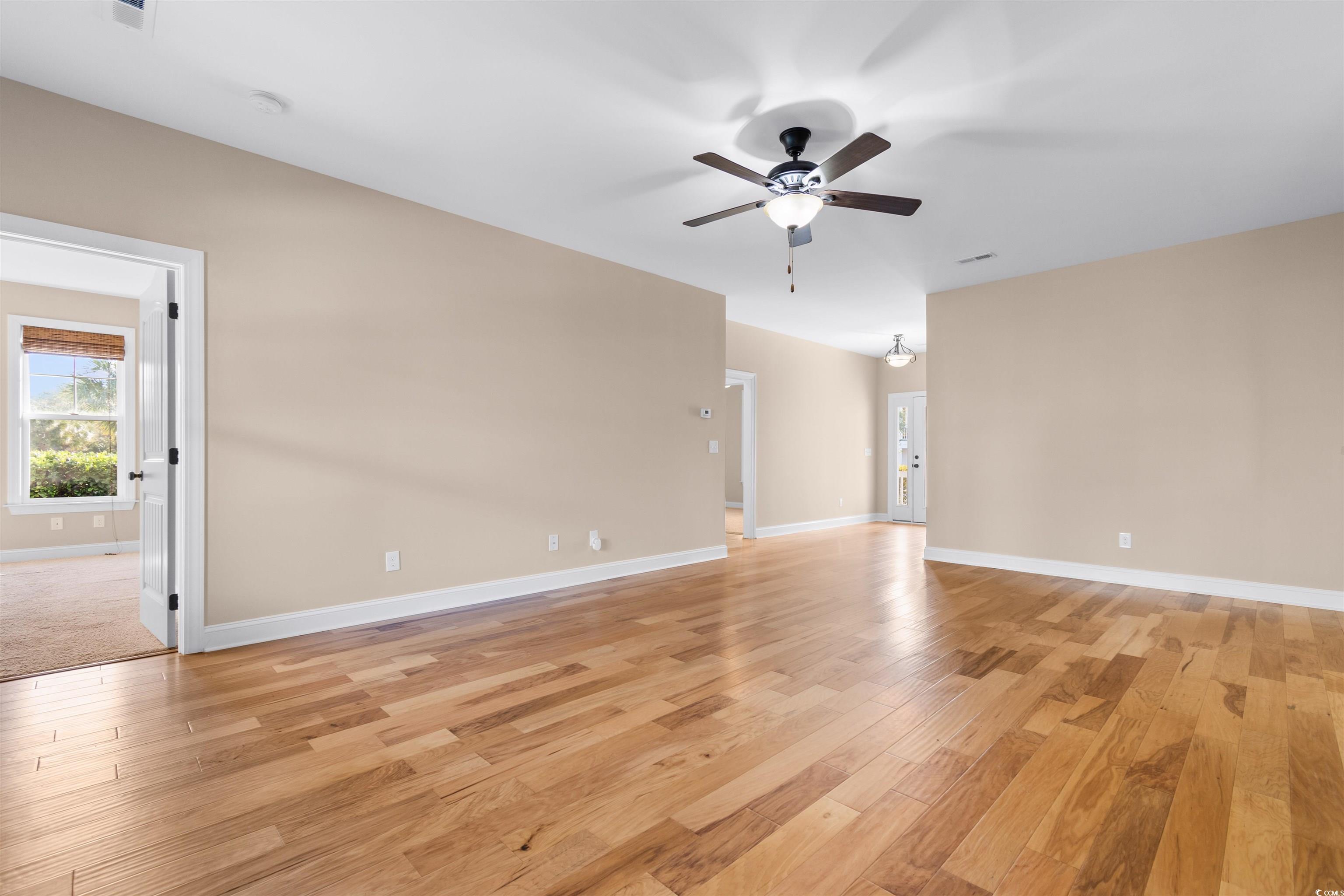 373 Graytwig Circle Murrells Inlet, SC 29576 - Photo 7 of 39 Unfurnished room featuring light hardwood / wood-s