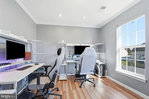 a view of house with a garden