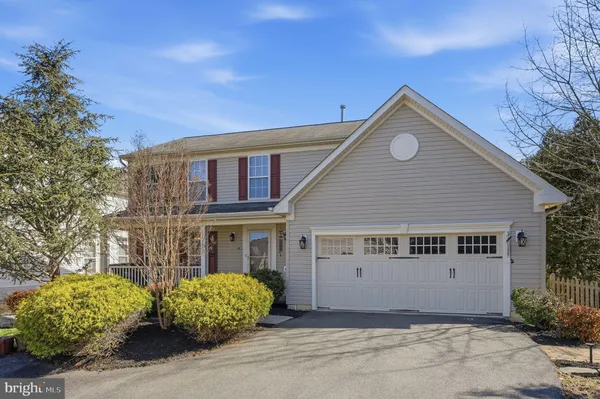a view of a balcony with wooden fence