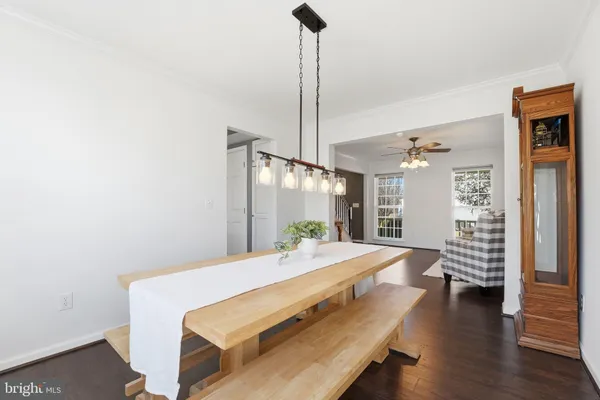 a kitchen with stainless steel appliances a refrigerator a stove a sink and a refrigerator