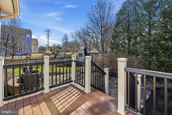 an aerial view of a house with outdoor space