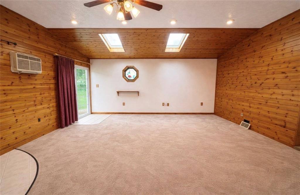 309 Emerson Street Vandergrift, PA 15690 - Photo 15 of 36 a view of a livingroom with a projector