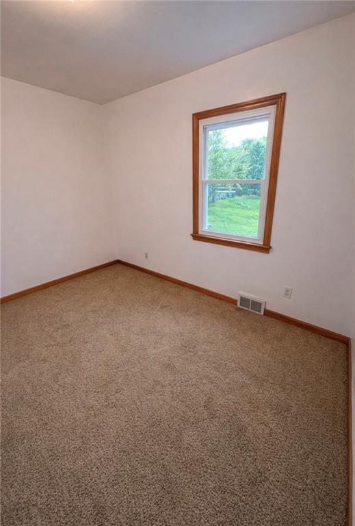 309 Emerson Street Vandergrift, PA 15690 - Photo 21 of 36 an empty room with a window