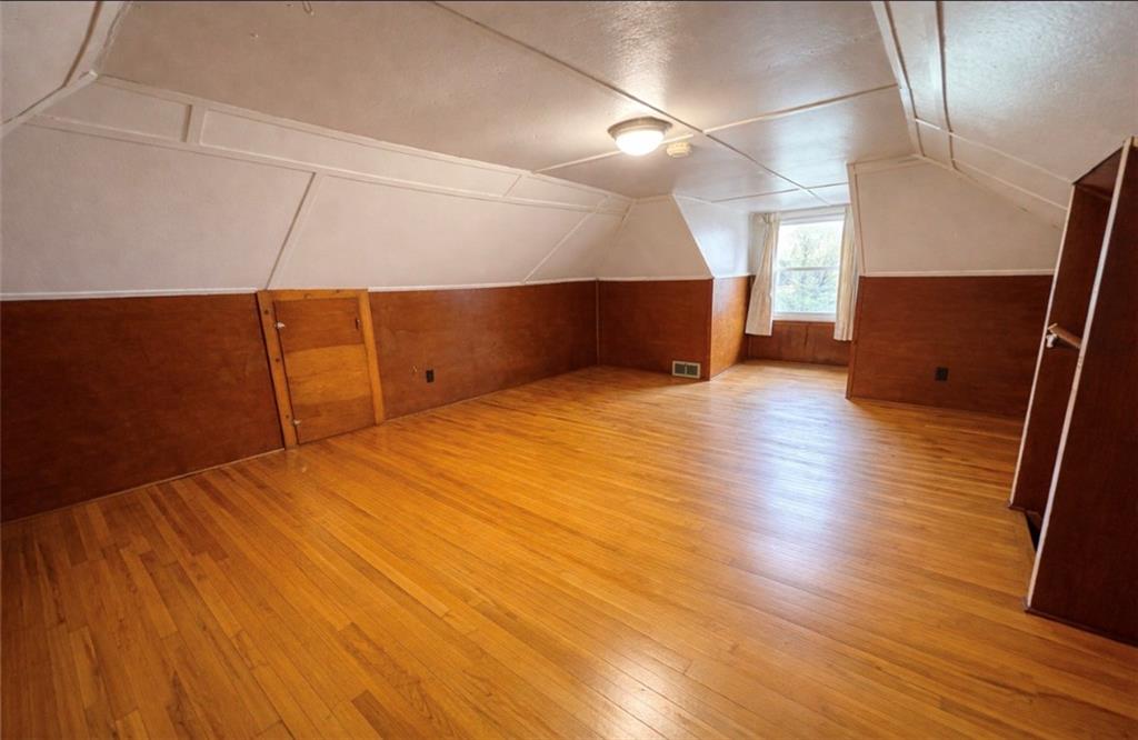 309 Emerson Street Vandergrift, PA 15690 - Photo 25 of 36 a view of a room with wooden floor