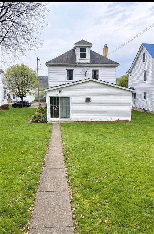 309 Emerson Street Vandergrift, PA 15690 - Photo 33 of 36 a front view of house with yard and green space