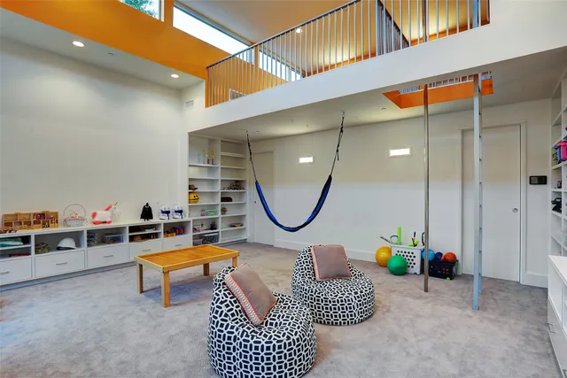 a bathroom with a double vanity sink mirror and shower