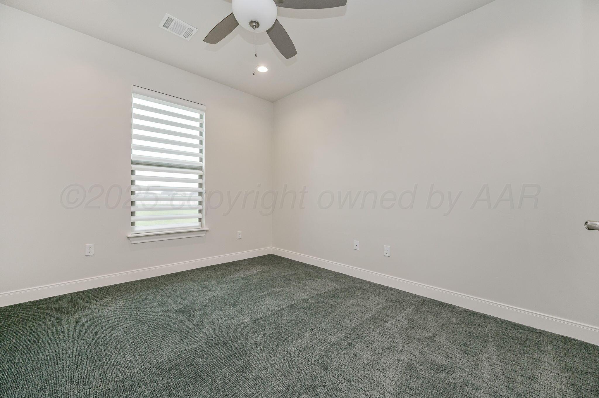 9734 Cicada Trail Amarillo, TX 79119 - Photo 23 of 34 an empty room with a window