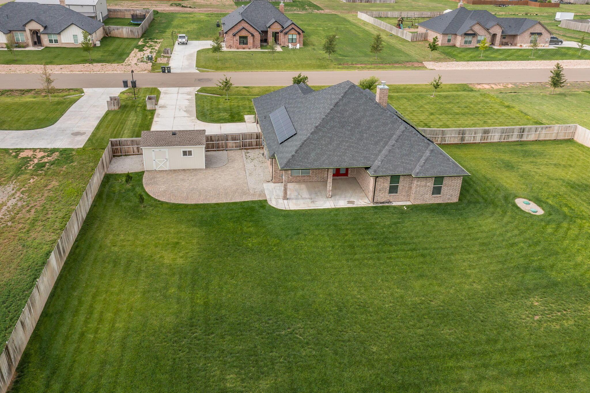 9734 Cicada Trail Amarillo, TX 79119 - Photo 3 of 34 an aerial view of a house