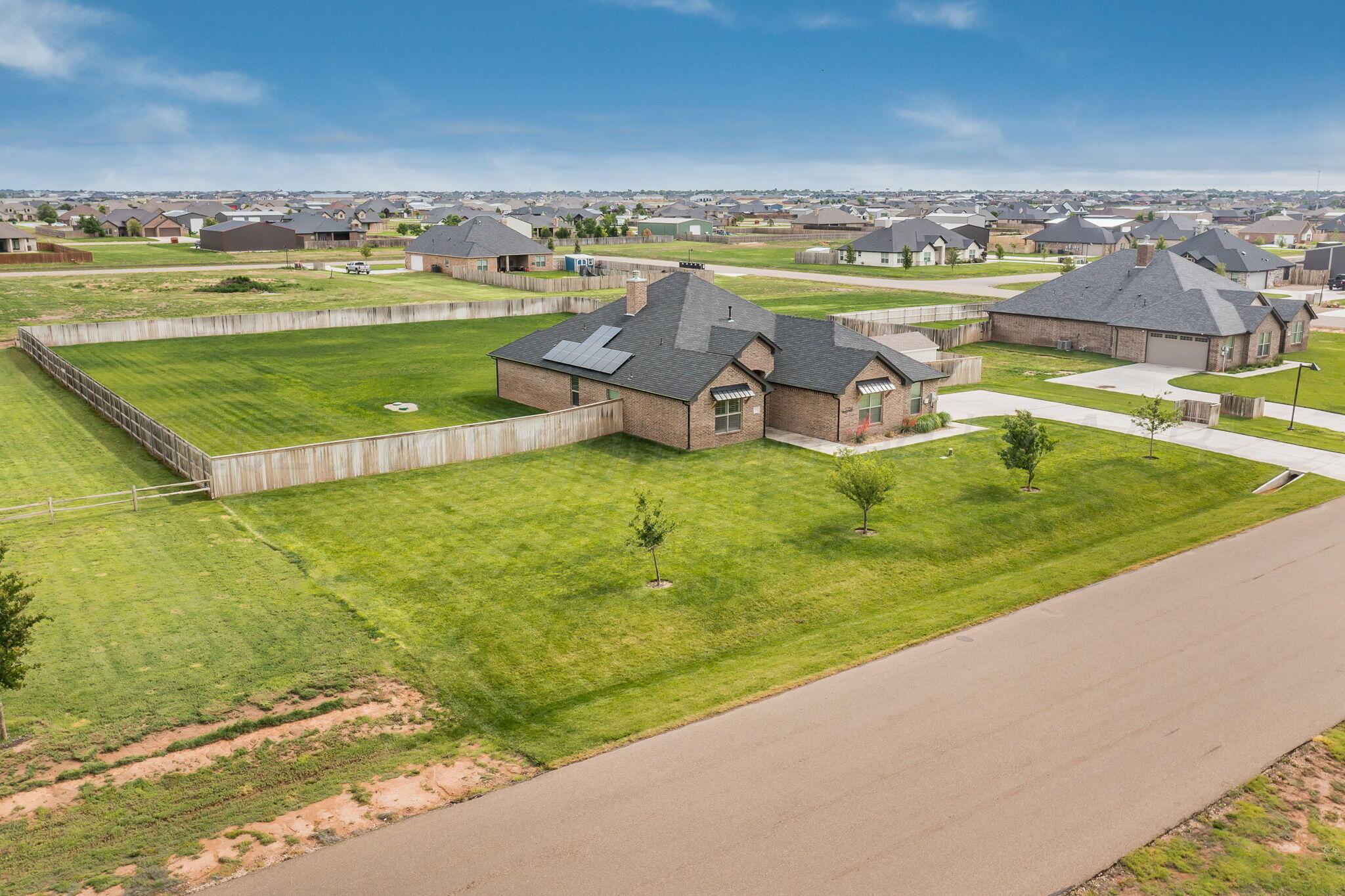 9734 Cicada Trail Amarillo, TX 79119 - Photo 31 of 34 a view of a swimming pool and an outdoor seating